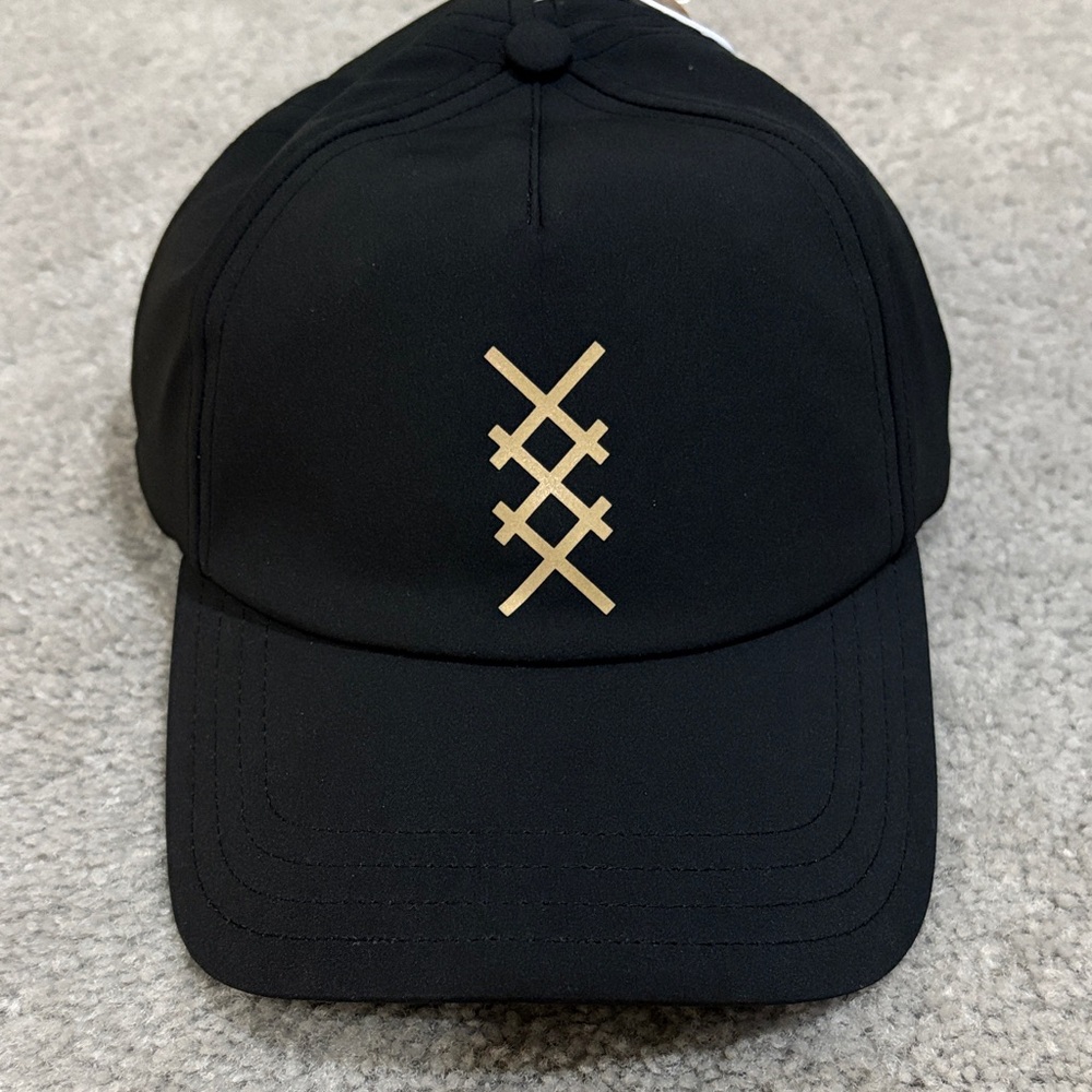 RHONE Black Hat with Gold Emblem